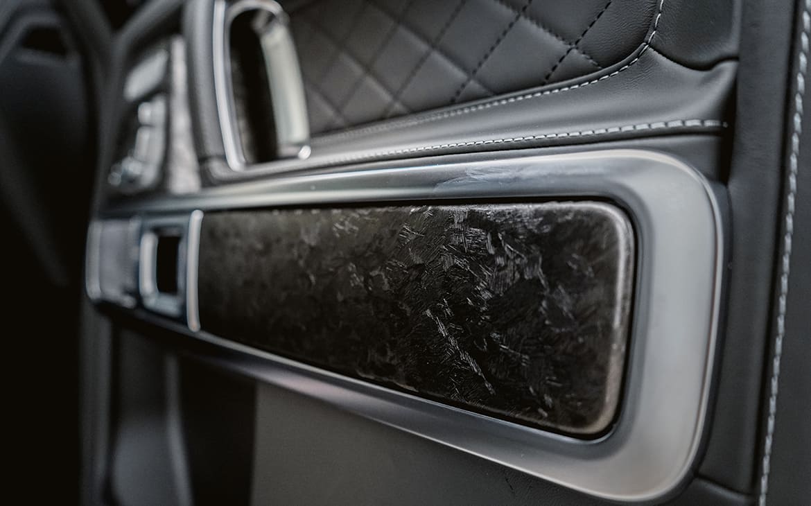 Оклейка деталей салона BMW X3 виниловой пленкой под дерево